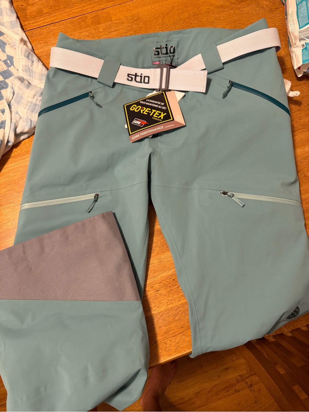 Stio Women’s Teal Shell Ski Pants with White Belt